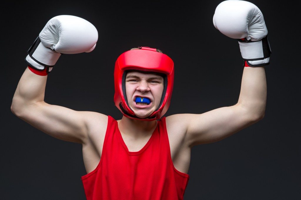 boxer wearing helmet and mouthguard