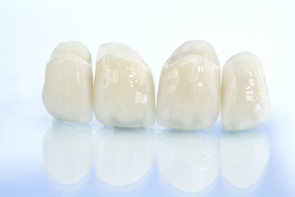 Dental crowns on white background