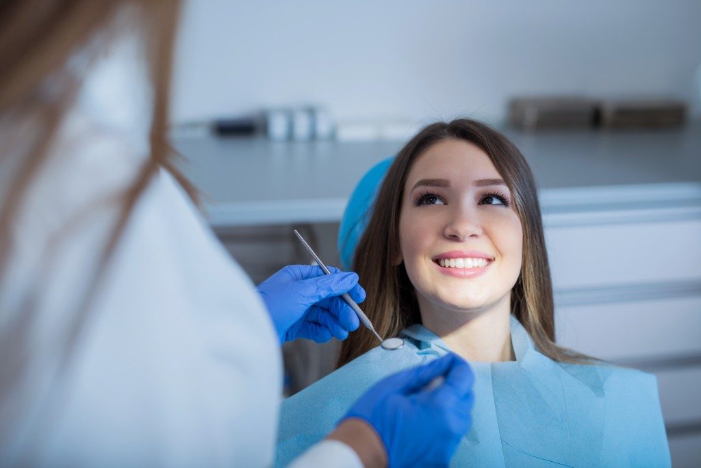 Female patient at the dentist