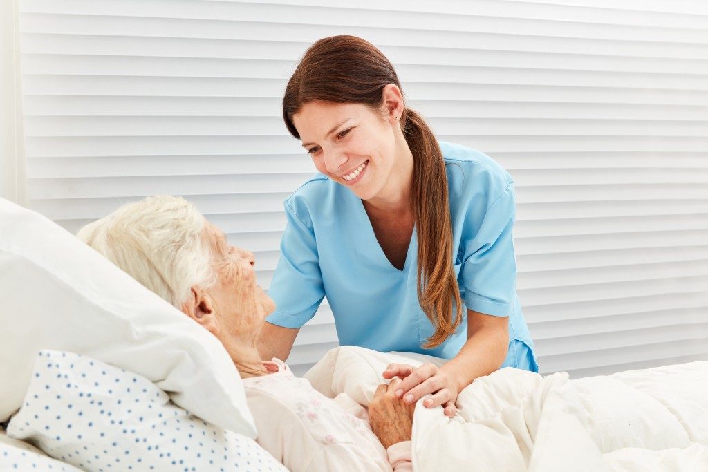 elderly and nurse in a hospice care