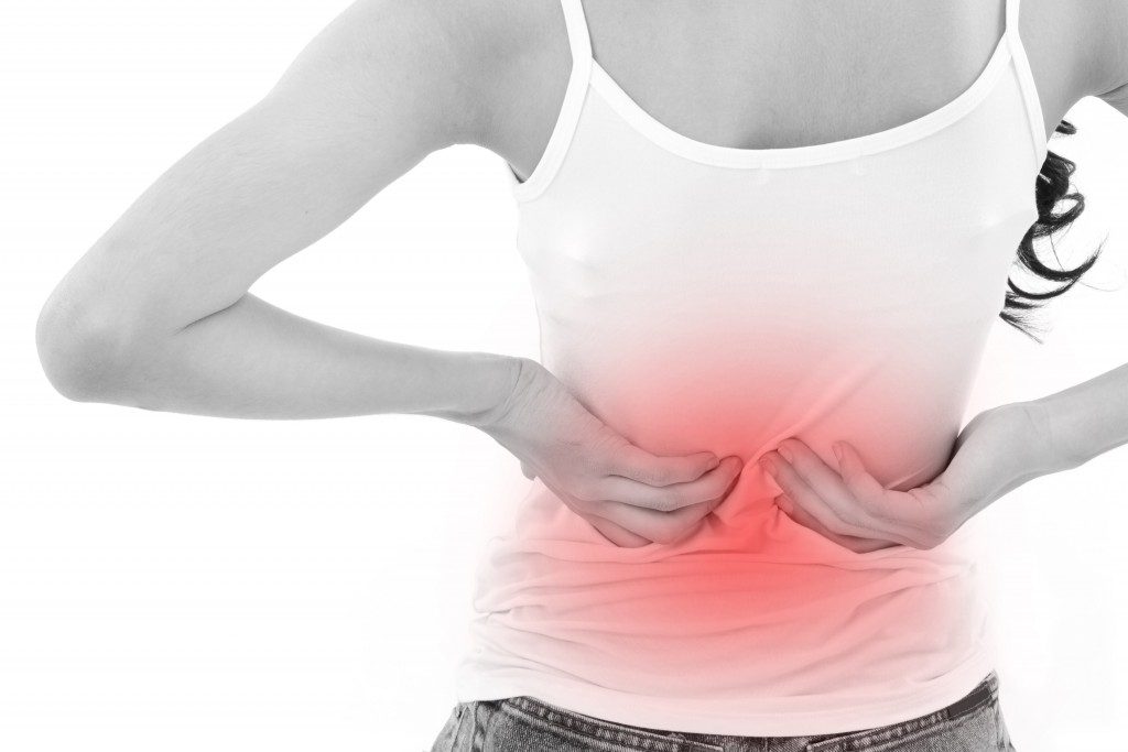 woman suffering from back pain