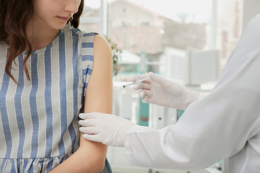 Receiving vaccination
