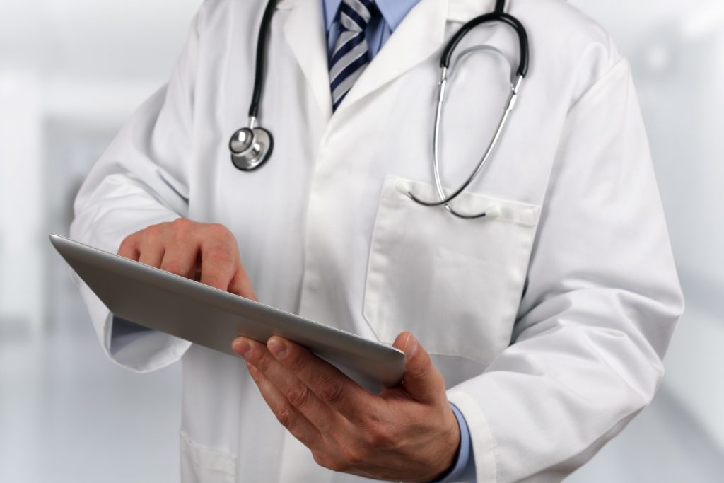 doctor using a digital tablet