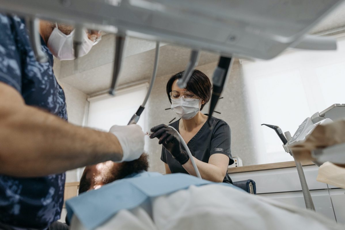 dentist operating on a patient
