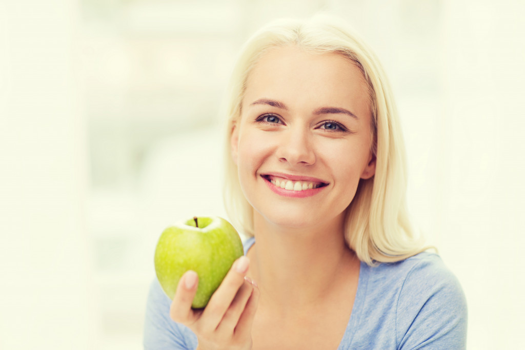 A person eating healthily for good teeth
